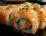 Chrupiące rolki sushi z awokado i krewetką, posypane szczypiorkiem. Idealne, gdy masz ochotę na coś pysznego do sushi.